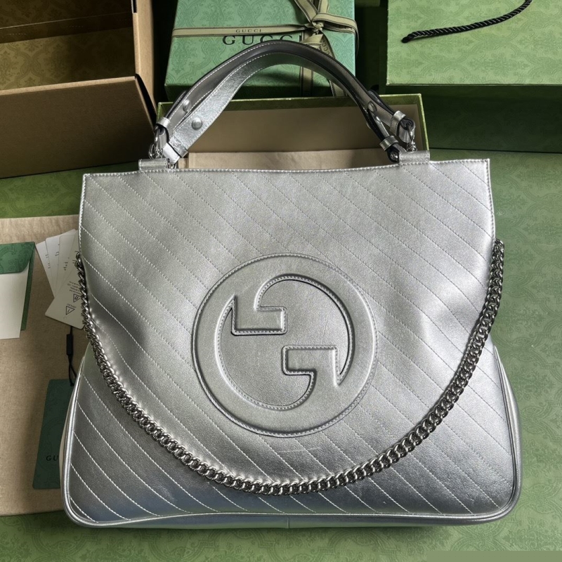 G*u*i top handle bags